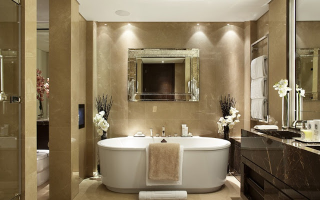 Luxury marble bathroom with white bathtub 