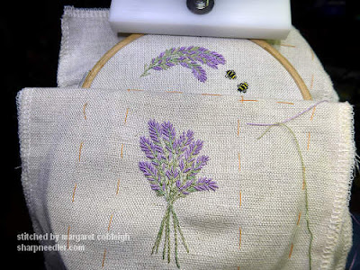 An embroidered lavender bunch along with a lavender spray and two bees. These are the required embroidery elements for the Lavender and Bees Scissors Keeper.