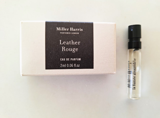 Bone & black Miller Harris rectangular sample box with bone upper & lowercase font & 2-ml sample vial with black font & top.