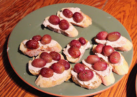 Roasted grape and goat cheese crostini