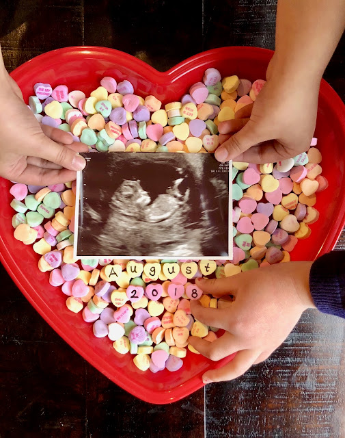 pregnancy announcement with candy hearts, valentines day pregnancy announcement 