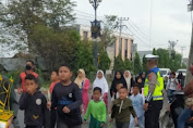 Personel Polres Bireuen Kawal Kegiatan Jalan Santai Dalam Rangka Musywil Ke-39 Muhammadiyah Dan Aisyiyah Aceh Tahun 2023.