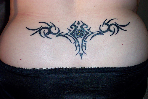 Lower Back Tribal Tattoo Design For Female