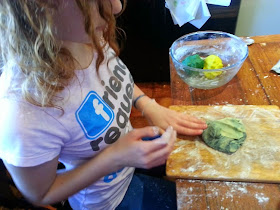 Kneading colour into cookie dough