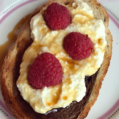 Coffee Syrup toast on marble rye with ricotta and raspberries