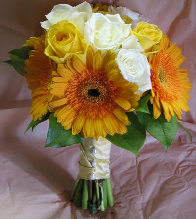 Lovely and beautifully textured wedding bouquet with yellow roses 