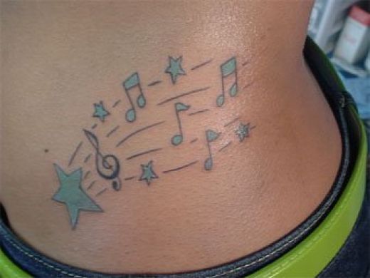 musical notes tattoo. music note tattoo designs.