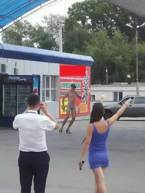 Russian Gas Station Offers Free Fuel For Those Wearing Bikini, And Men Accepted The Challenge