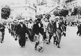 Members of the Lithuanian Militia Leading Jews to the Seventh Fort in Kovno, Lithuania 25 June 1941 worldwartwo.filminspector.com