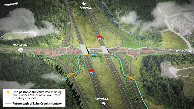 Aerial view of the future Diverging Diamond Interchange at the intersection of Interstate 90 and State Route 18. The future path of a tributary to Lake Creek is shown in blue. Two fish passable structures under ramps between the highways and a pair of walls under I-90, where a stream channel will be built, are highlighted in orange.