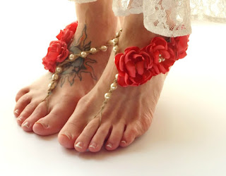 http://www.mojosfreespirit.com/collections/wedding-sandals/products/floral-barefoot-sandals-bridesmaids-flower-color-options-ivory-pearl