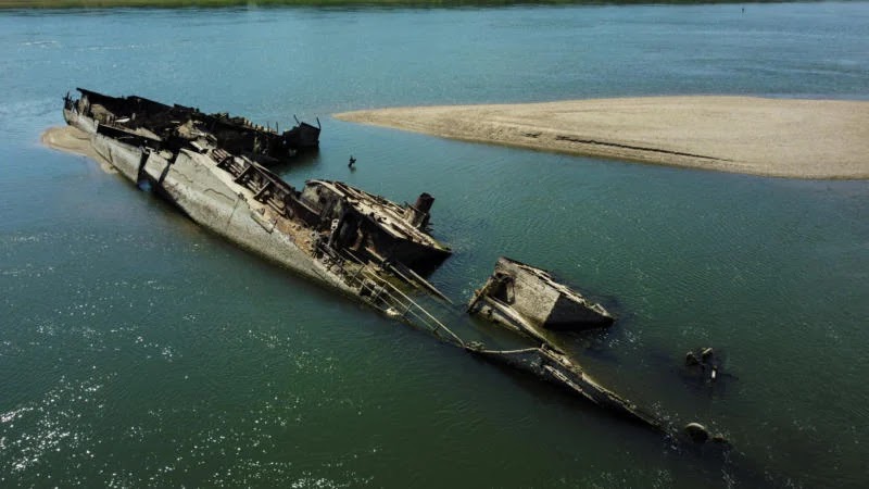 Europe’s drought exposes WWII ships, bombs and prehistoric stones
