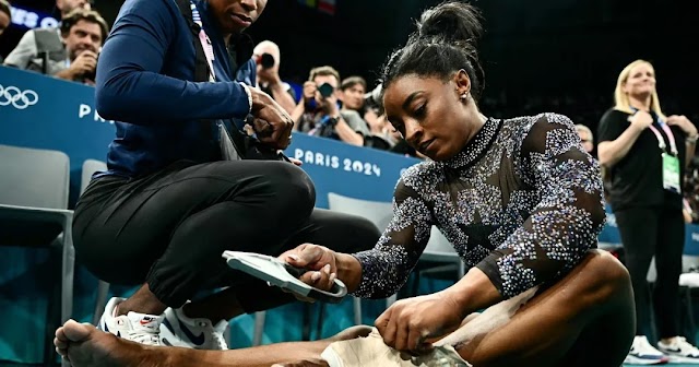 WATCH: Simone Bile lead the U.S. gymnastics team through qualifying on a hurt calf