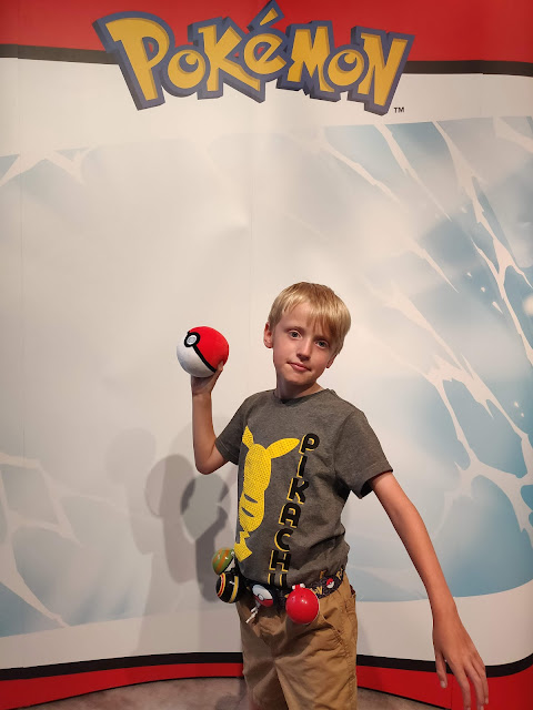 madmumof7's son with Pokemon Clip N Go Belt and Pop Action Poke Ball