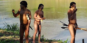 This photo taken from video released by Brazil's National Indian Foundation (Funai) show some of the male members of an isolated Amazon tribe to first make contact with the outside world.
