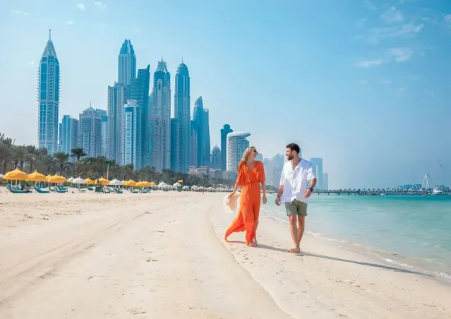 A tourists couple walking in dubai