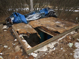 well pit cover with rotten wood