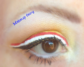 eye makeup yellow and triple eyeliner