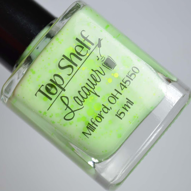 green nail polish with neon green glitter
