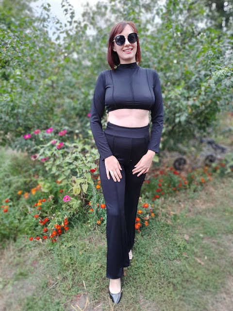 https://femmeluxe.co.uk/black-high-neck-long-sleeve-crop-top-high-waisted-trousers-seam-detail-co-ord-selah