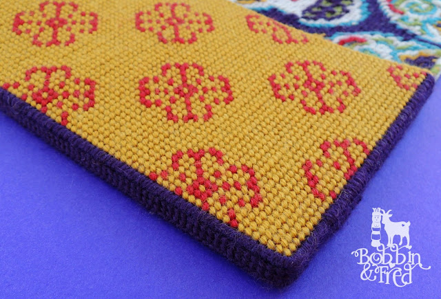 Fairisle tent stitch in mustard and red for a plastic canvas book cover