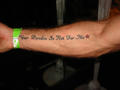 The last of my Cool Arm Tattoos is a Quotes Arm Tattoo Your paradise is not 