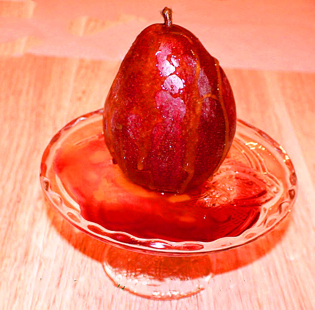 pears in a syrup made with red wine