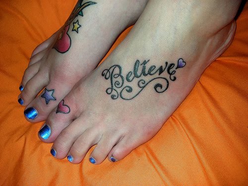 girls tattoos on feet with believe tattoo and heart tattoo designs