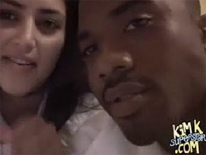 Kim Kardashian and Ray J kissing