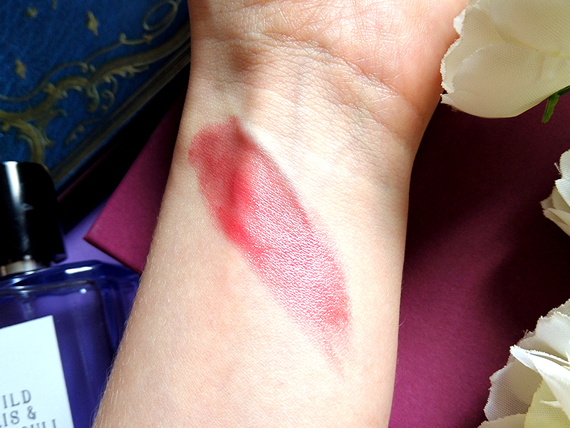 Chantecaille Lip Chic China Rose colour swatch on arm