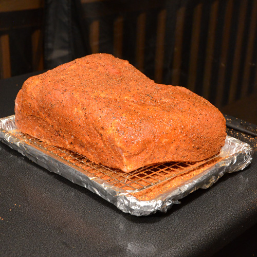 Smithfield pork butt getting ready to go on the Big Green Egg for smoking.