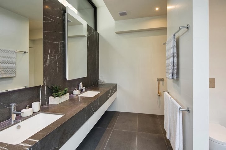 Bathroom in Contemporary Style Home by Domoney Architecture