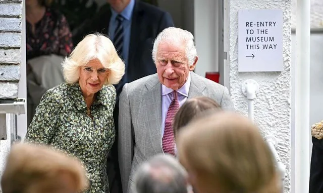 Queen Camilla wore a green floral print midi shirt dress by Samantha Cameron. Barbara Hepworth Museum and Sculpture Garden