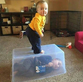 KID TRAPPED HIS SIBBLING IN A PLASTIC BOX