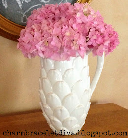 White artichoke pitchers vases hydrangeas 