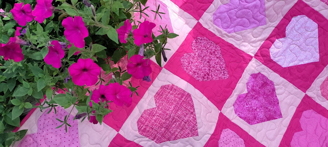 Pink heart quilt made with fabrics all from JOANN