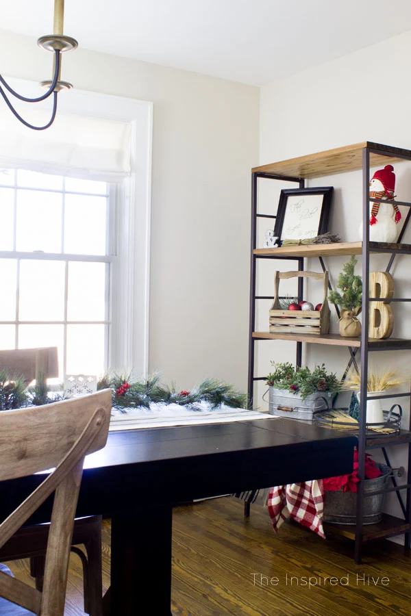 Decorating ideas for a classic Christmas farmhouse style dining room. 