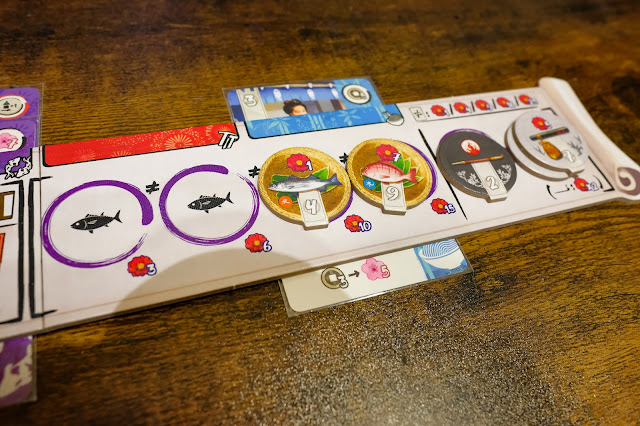 iki board game 江戶職人物語 桌遊 漁獲和袋裝菸草等token放置在個人主板上