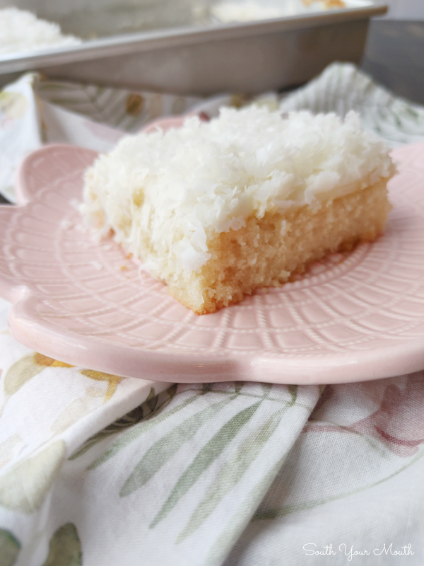 Coconut Texas Sheet Cake! A velvety tender sheet cake recipe made with coconut milk for a super moist texture and tons of coconut flavor.