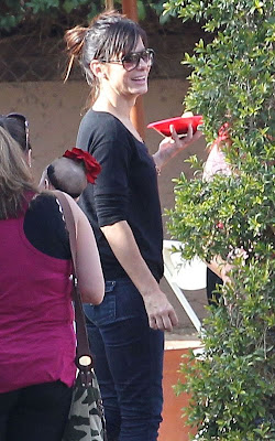 Sandra Bullock and her son Louis Bullock attending a Christmas Party in Santa Monica