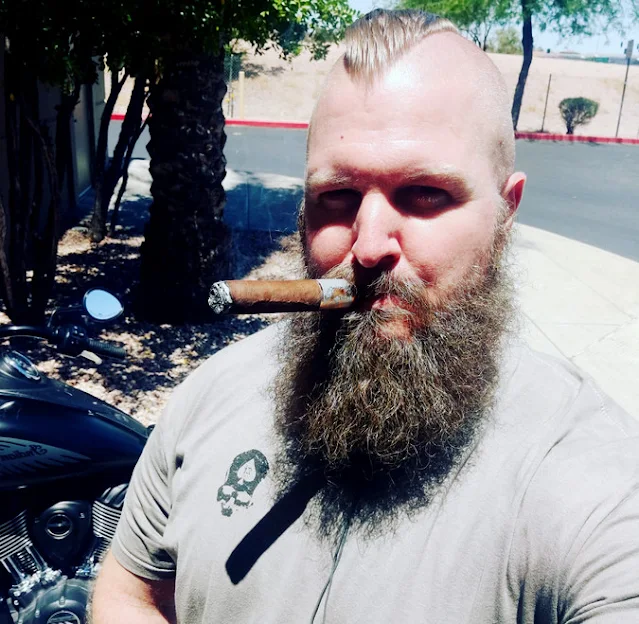 2/2 Fat bear dirty blonde dad smoking a gar outside with heads shaved on sides
