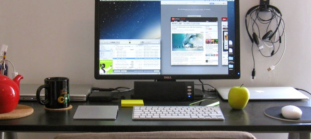 MacBook charging peacefully beside my PC desktop