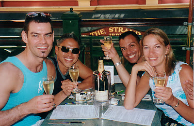 Toasting with Patrick, Adian, and Kim in 2002