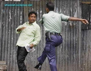 hortal photos- police man charging
