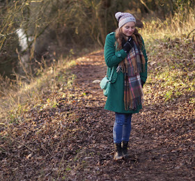 wearing a hat and scarf in winter