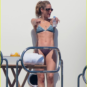 doutzen-kroes-packs-on-the-pda-in-saint-tropez-bikini-pics-37.jpg