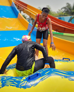 female guests overwhelmed with excitment at the black hole slide at park vega waterpak for festival celebration