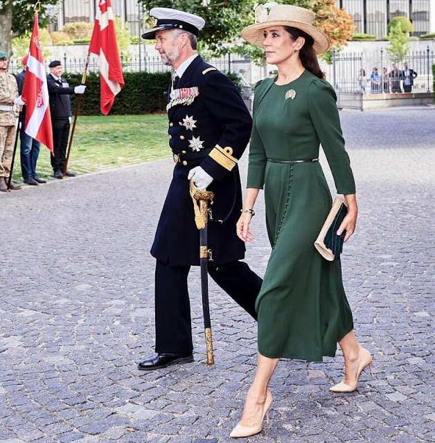 Crown Princess Mary wore a Yahvi olive green midi dress by Beulah London. Crown Prince Frederik and Crown Princess Mary