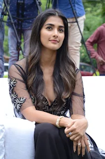 Actress Pooja Hegde Stills in black dress at Valmiki movie Press Meet