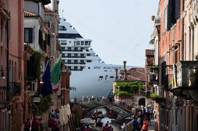 Cruise ship overshadows Venetian canal